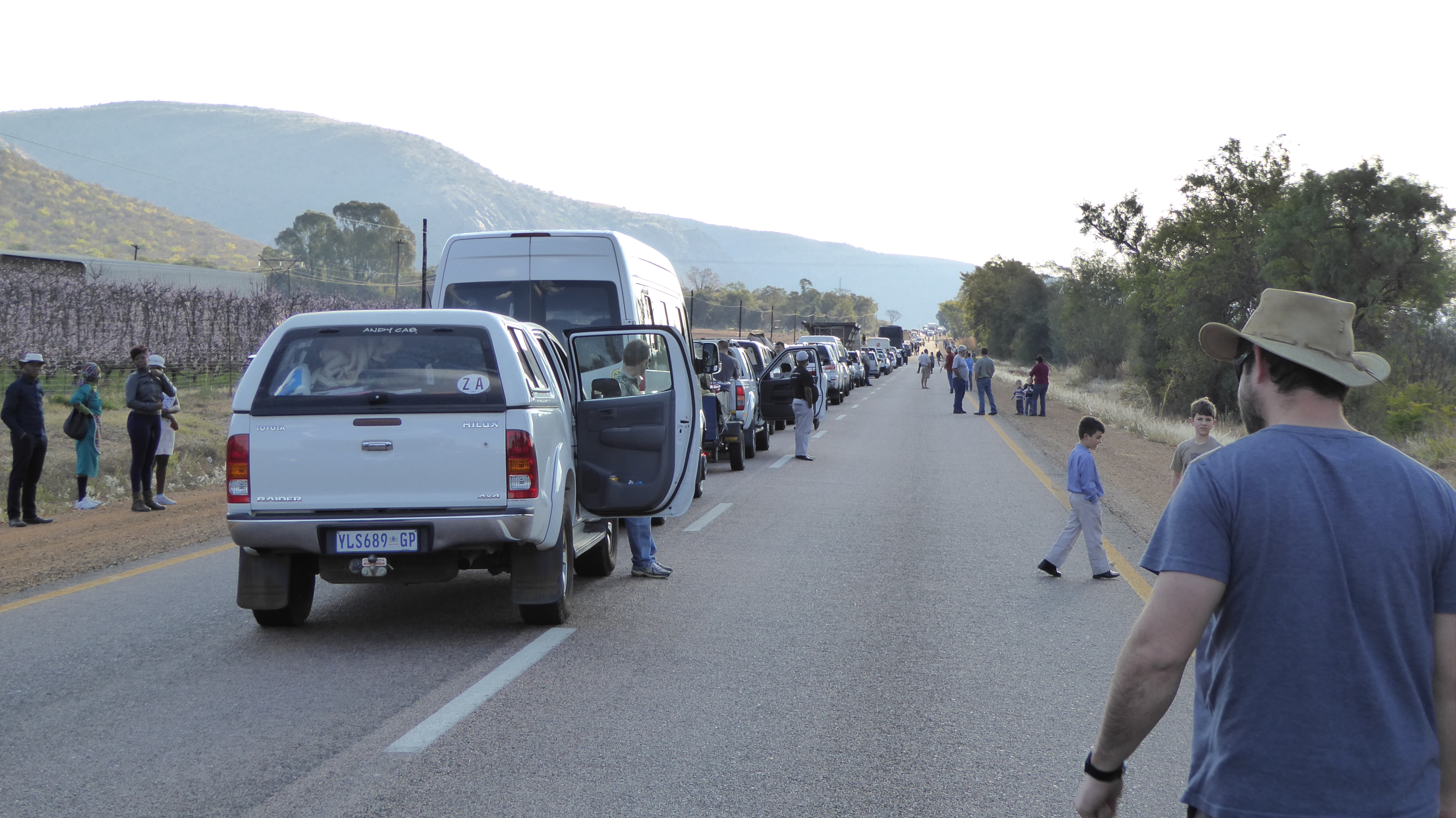 Traffic at a total stand still, on the highway. 